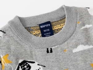 Detail of grey knitted kids sweater featuring ribbed crew neck and cartoon sheep jacquard