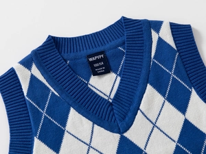 Detailed close-up of V-neck argyle sweater vest with ribbed trim and knit texture