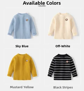Detail view of four ribbed knit sweaters for kids featuring cute lion patches and fold-up cuffs