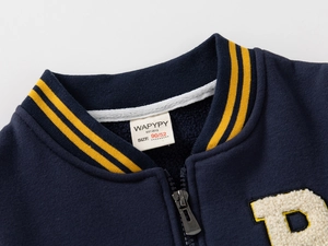 Detail of kids baseball jacket showing ribbed collar and terry embroidery patch