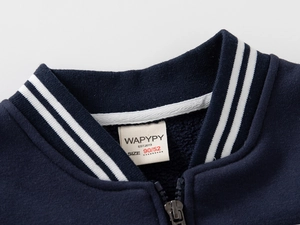 Macro detail of navy blue baseball jacket rib-knit collar with white sporty stripes