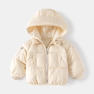 Detailed close-up of ribbed windproof cuffs and arm zipper pocket on kids winter coat