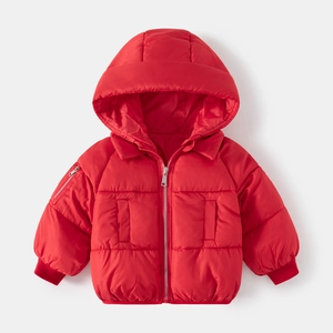 Detail of red padded winter jacket for boys with windproof hood and metallic zipper