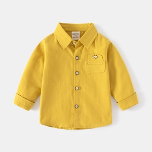 Classic yellow long-sleeved cotton shirt for boys with a chest pocket and button front