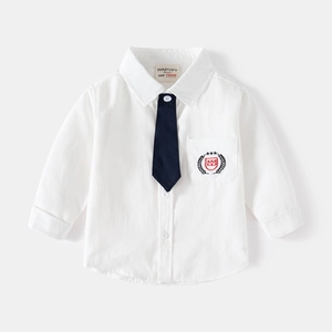 Classic boys white long sleeve shirt with navy tie and embroidered crown crest pocket
