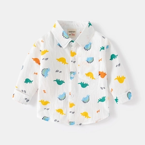 Chemise garçon à manches longues avec motifs de dinosaures colorés sur coton blanc respirant
