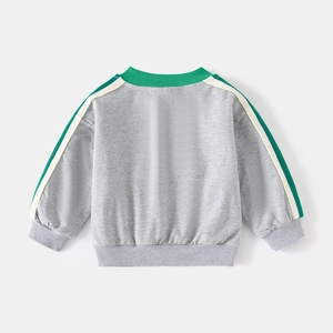 Rear detail of gray kids' sweatshirt with green contrast stripes on wide shoulders