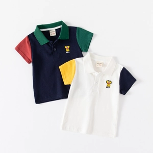 Kids short sleeve polo shirts with lion embroidery in navy and white color blocks
