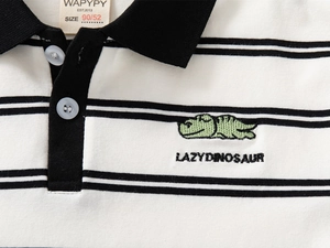 Detail of children's striped polo shirt with dinosaur embroidery and black collar