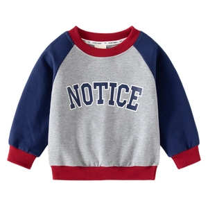 Boy's color block raglan sweatshirt with NOTICE print and ribbed red trim details