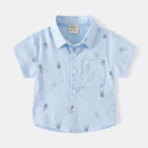 Kids short sleeve shirt with light blue space astronaut print and white buttons