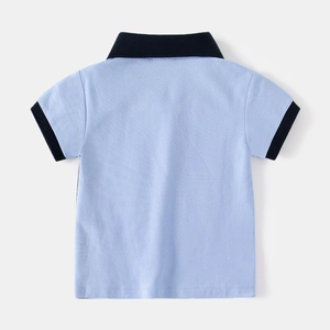 Classic light blue boy's polo shirt with navy contrast collar and cuffs, back view