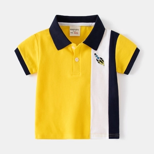 Boy's yellow cotton short sleeve polo shirt with navy blue and white color block panels
