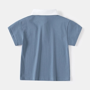 Rear view of kid's short-sleeve polo shirt with blue cotton body and white collar detail