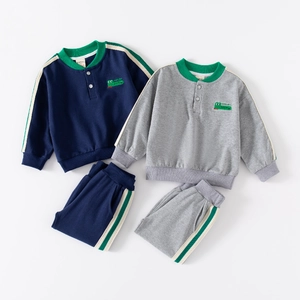 Kids casual two-piece cotton tracksuit featuring alligator embroidery and stripe trim