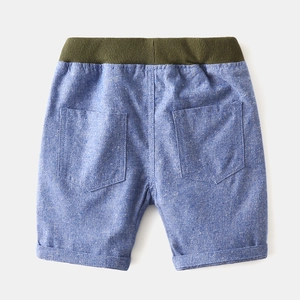 Back view of boys' casual blue melange shorts with green elastic waistband