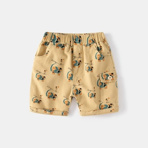 Detail of circus elephant print on cotton shorts with an elastic waist and cargo pocket