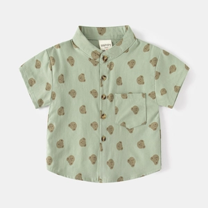 Short-sleeve cotton shirt for boys in light green featuring a cute brown bear print