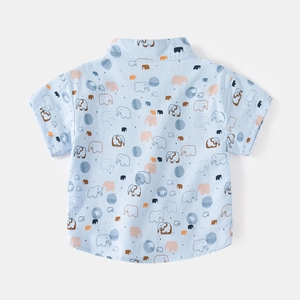 Boys short sleeve light blue cotton shirt with playful elephant prints for summer wear
