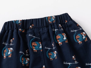 Detail of boys navy shorts with elastic waistband and circus elephant prints