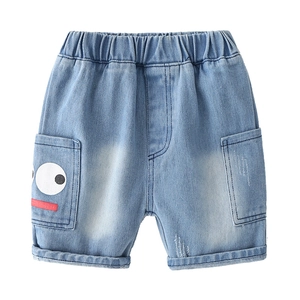 Kids light blue denim shorts with elastic waist and cute cartoon smiley face pockets