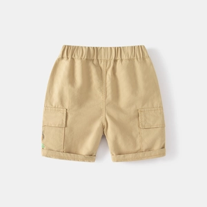 Detailed close-up of khaki cotton cargo shorts featuring elastic waistband and side pockets