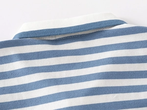 Close-up of boys' blue striped cotton polo shirt collar with neat stitching detail