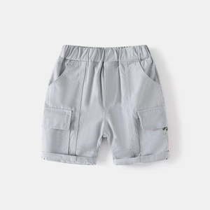 Detailed close-up of light gray cotton cargo shorts with elastic waist and pocket details