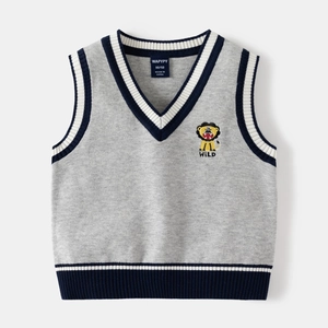 Detail of grey V-neck knit vest with lion embroidery and navy striped ribbing