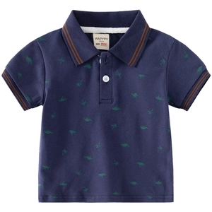 Kids navy polo shirt with green dinosaur and palm tree print in slim fit style