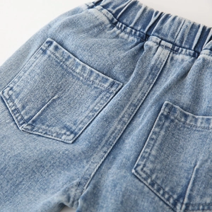 Classic blue wash boys' jeans with elastic waistband and double-stitched back pockets
