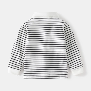 Detail view of the back of a kids' black and white striped long sleeve cotton polo shirt
