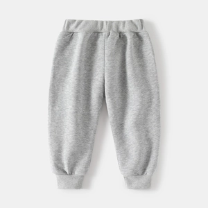 Detail of grey cotton jogger pants for boys with elastic ribbed waistband and cuffs