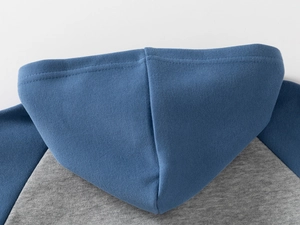 Detail shot of the hooded seam and blue-gray color block fabric on toddler hoodie