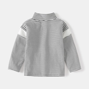 Kids black and white striped long sleeve shirt with a mock neck and relaxed fit design