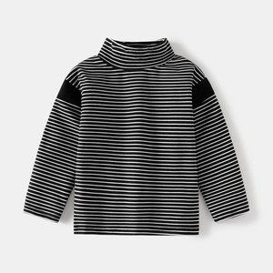 Kids black and white striped long sleeve top with mock neck and shoulder patch