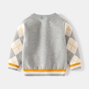 Kids grey knit sweater featuring diamond patterns and orange striped ribbed cuffs