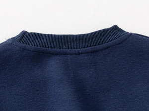 Detail of navy blue sweatshirt neckline featuring high-quality ribbed knitting and stitching