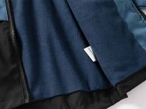 Detail of blue boy hoodie with warm fleece lining and sturdy zipper construction