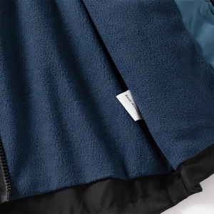 Winter boy hooded jacket detail showing warm dark blue fleece lining and high quality seams