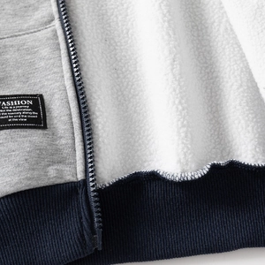 Boy's light grey hooded jacket with warm white fleece lining and navy ribbed hem