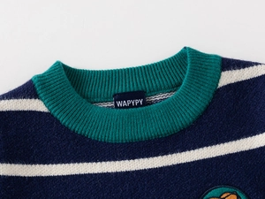 Detail of child striped sweater neck with green ribbed collar and soft knit texture