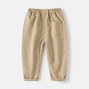 Close-up of khaki kids trousers featuring elastic waistband and back pocket detail