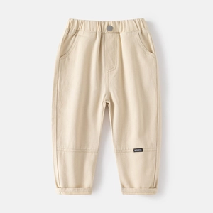 Boys beige casual cotton pants with elastic waist and stylish knee stitching details