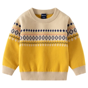 Flat lay of a yellow and beige knitted sweater for boys with geometric patterns