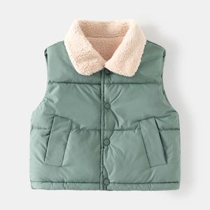 Detail of green children's padded vest featuring warm beige fleece collar and snap buttons