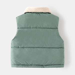 Detail view of children's green quilted vest with white faux fur collar and back stitching
