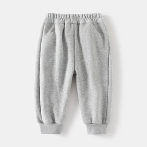 Detailed view of kids grey fleece jogger pants with elastic waistband and ribbed cuffs