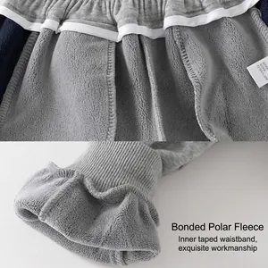 Thick grey polar fleece boys' winter pants with high elastic waist and ribbed cuffs