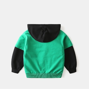 Detail view of children's green hooded sweatshirt with black contrast sleeves and ribbed hem